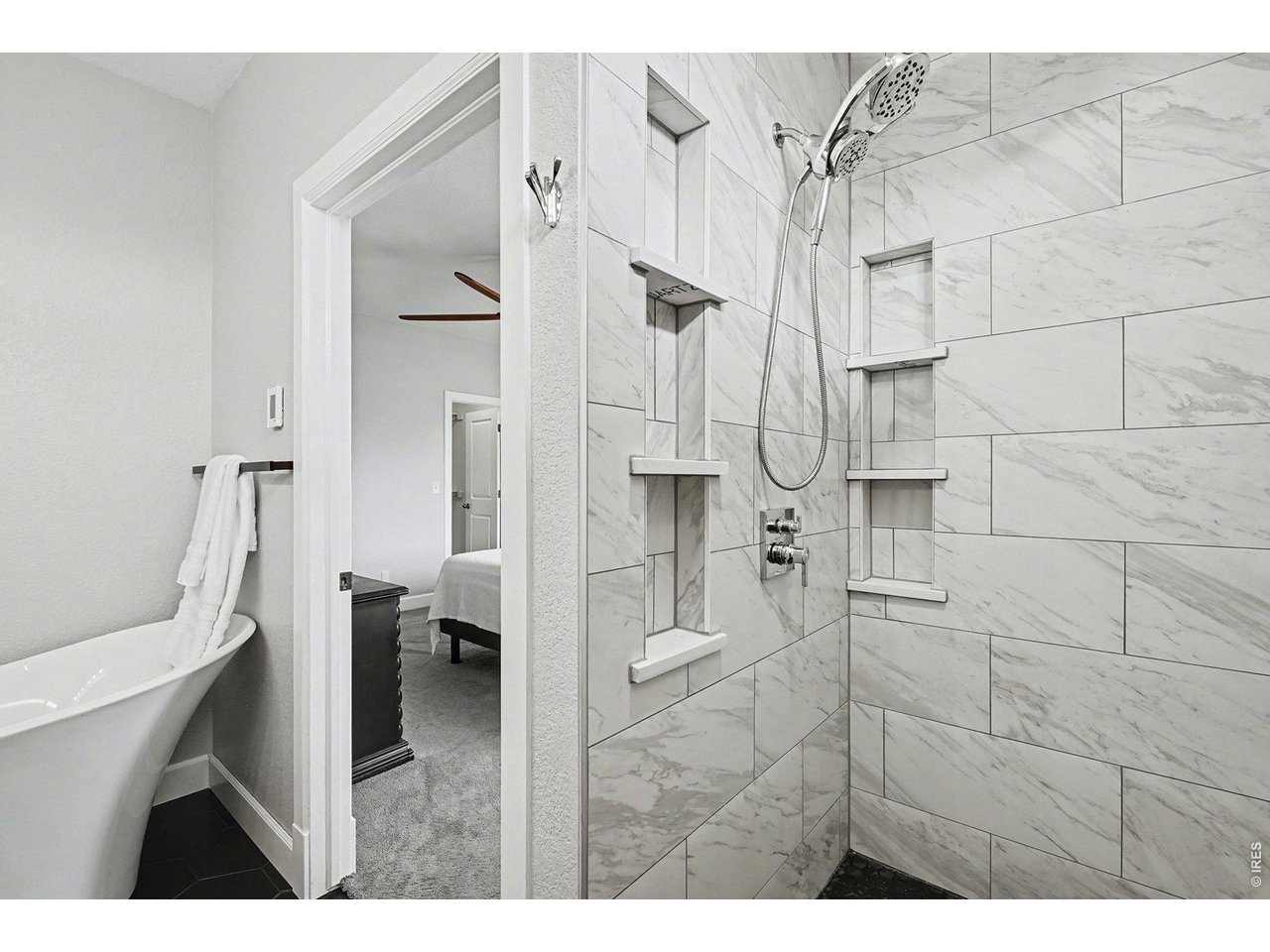 844 Cliffrose Way Severance, CO 80550 - Photo 21 of 50 a bathroom with a sink and toilet