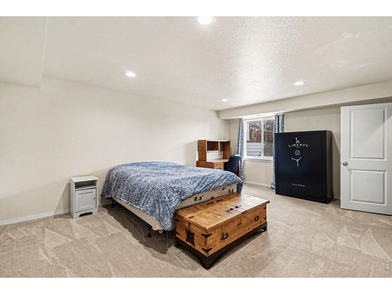 844 Cliffrose Way Severance, CO 80550 - Photo 25 of 50 a bedroom with a bed and a closet