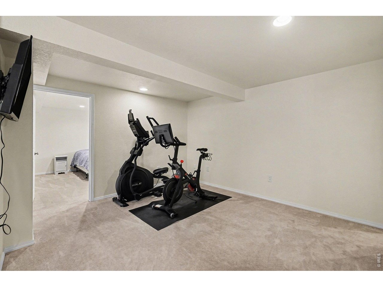 844 Cliffrose Way Severance, CO 80550 - Photo 30 of 50 a room with gym equipment