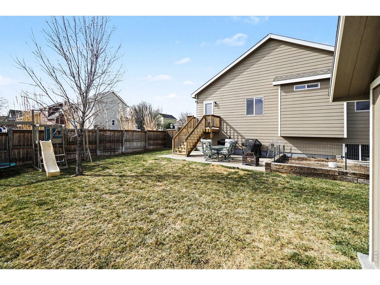 844 Cliffrose Way Severance, CO 80550 - Photo 38 of 50 a view of a house with backyard