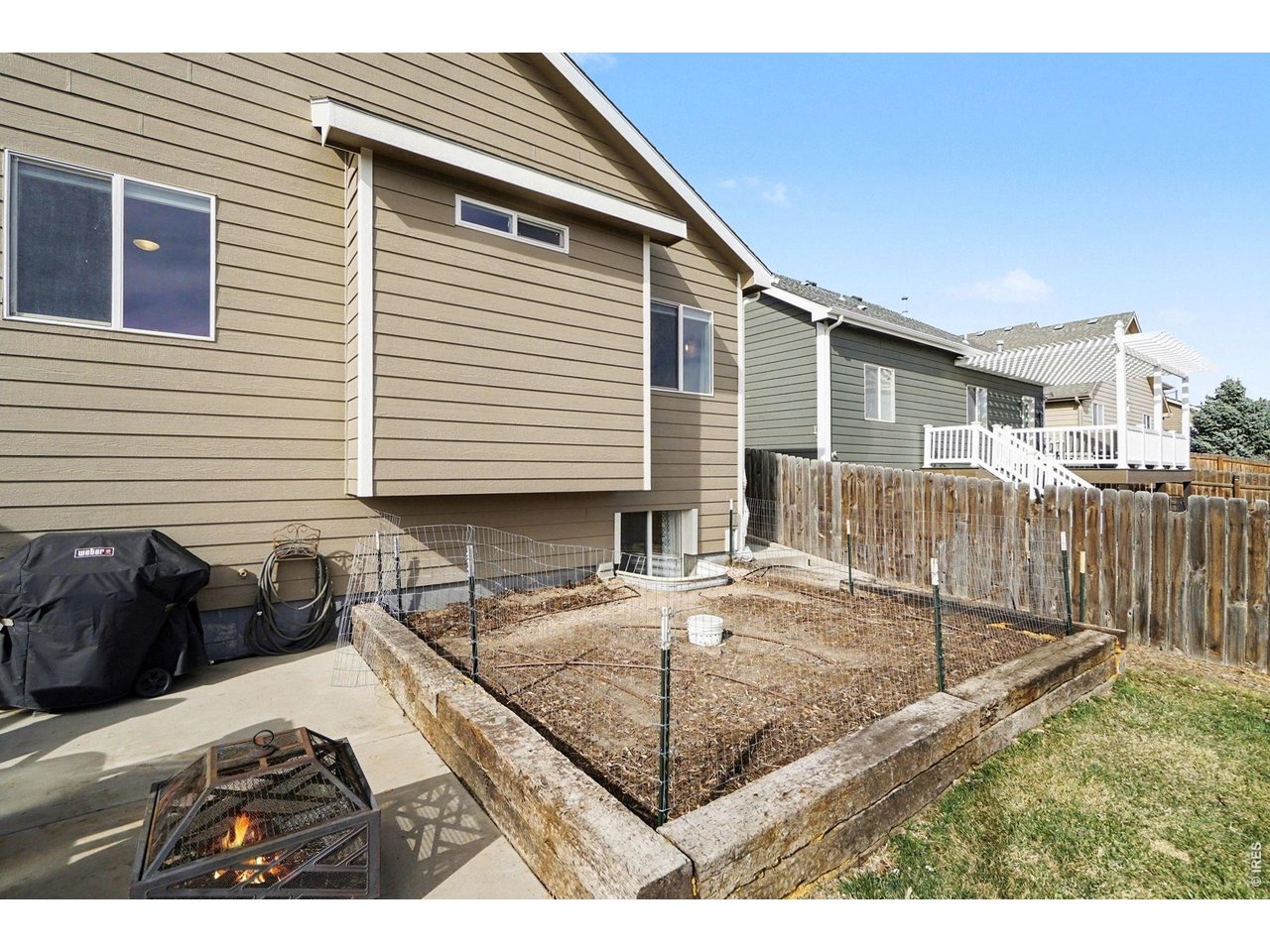 844 Cliffrose Way Severance, CO 80550 - Photo 39 of 50 a view of a house with backyard