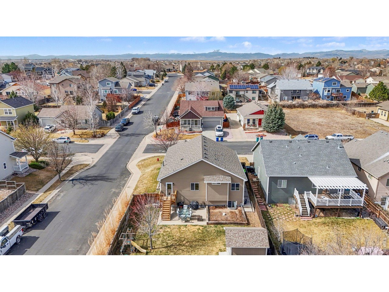 844 Cliffrose Way Severance, CO 80550 - Photo 42 of 50 an aerial view of a house with a swimming pool