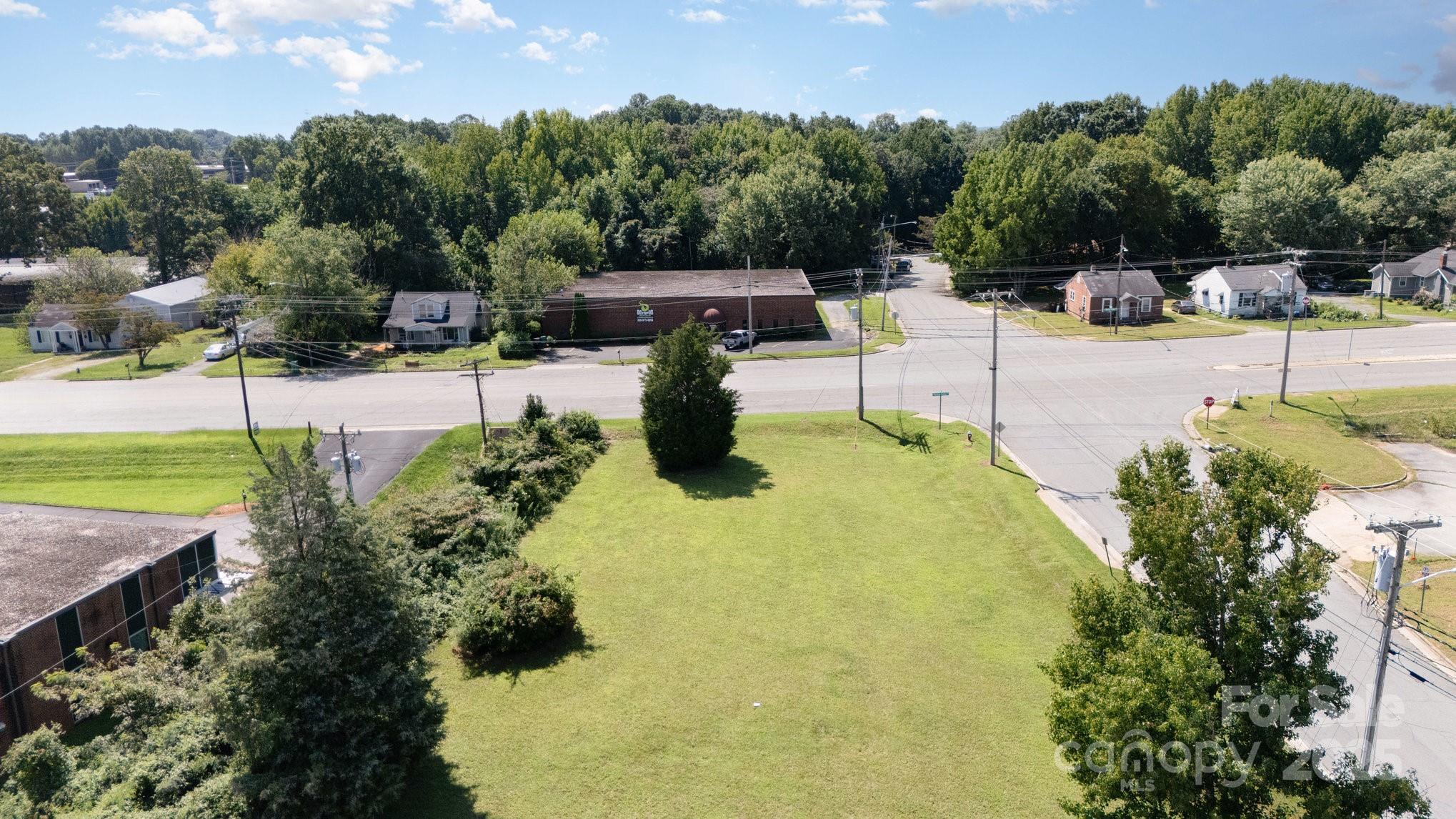 1300 Starr Drive High Point, NC 27260 - Photo 3 of 10 a view of a swimming pool with a patio
