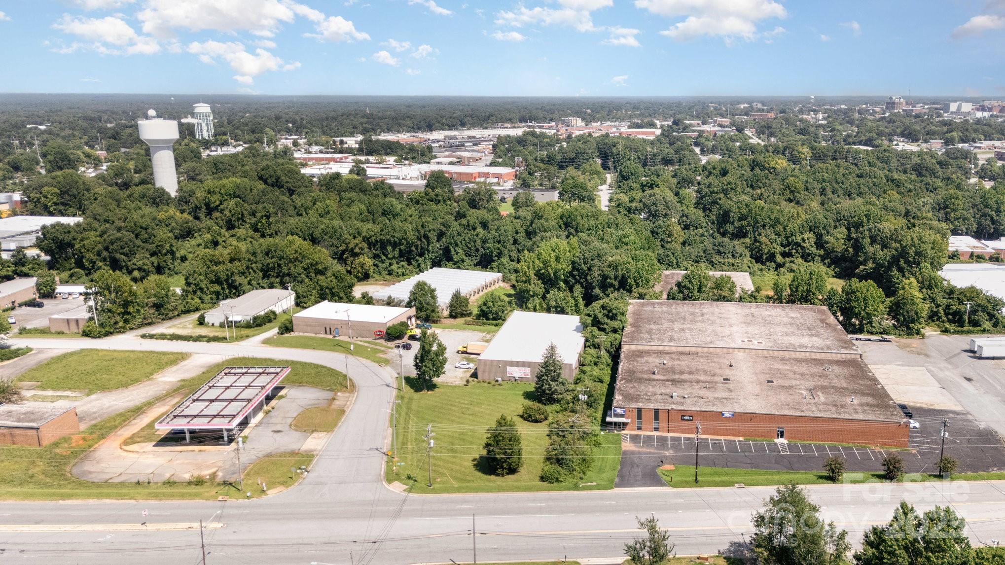 1300 Starr Drive High Point, NC 27260 - Photo 5 of 10 an aerial view of a house with yard and mountain view in back