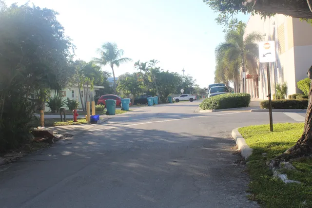 a childrens park with lots of swings and slides