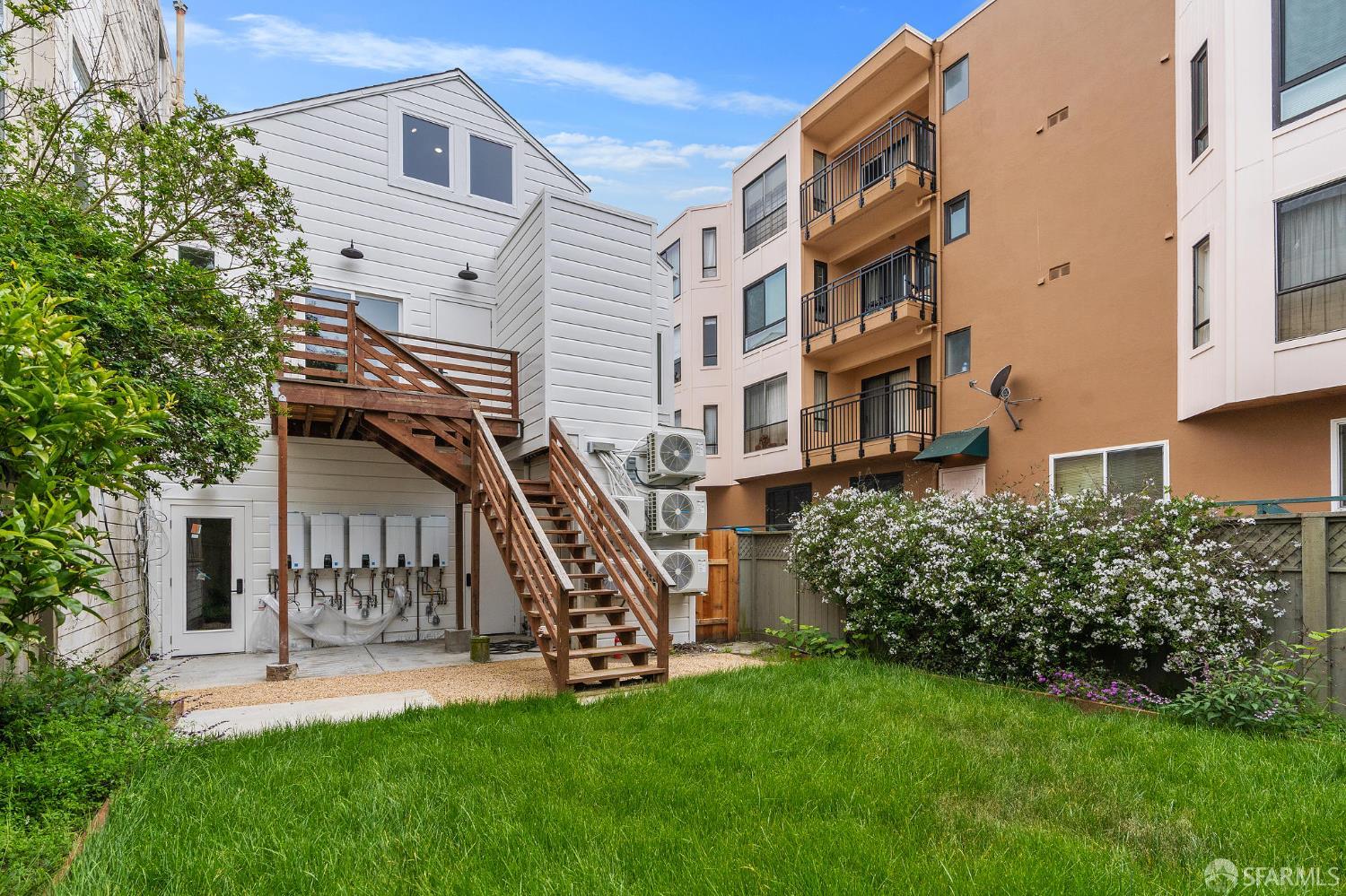 3036 Fulton Street, Unit 1 San Francisco, CA 94118 - Photo 11 of 13 front view of a house with a yard
