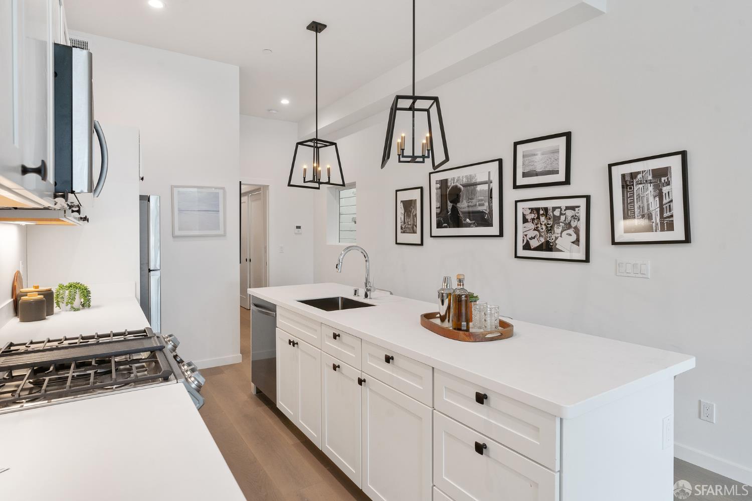 3036 Fulton Street, Unit 1 San Francisco, CA 94118 - Photo 4 of 13 a kitchen with cabinets and window
