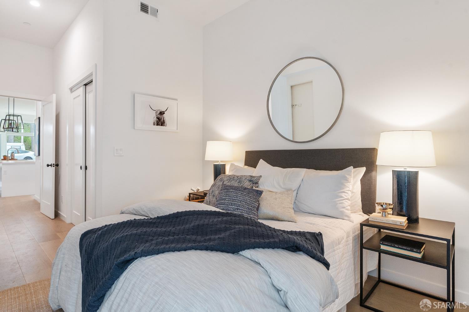 3036 Fulton Street, Unit 1 San Francisco, CA 94118 - Photo 7 of 13 a bedroom with a bed and a lamp