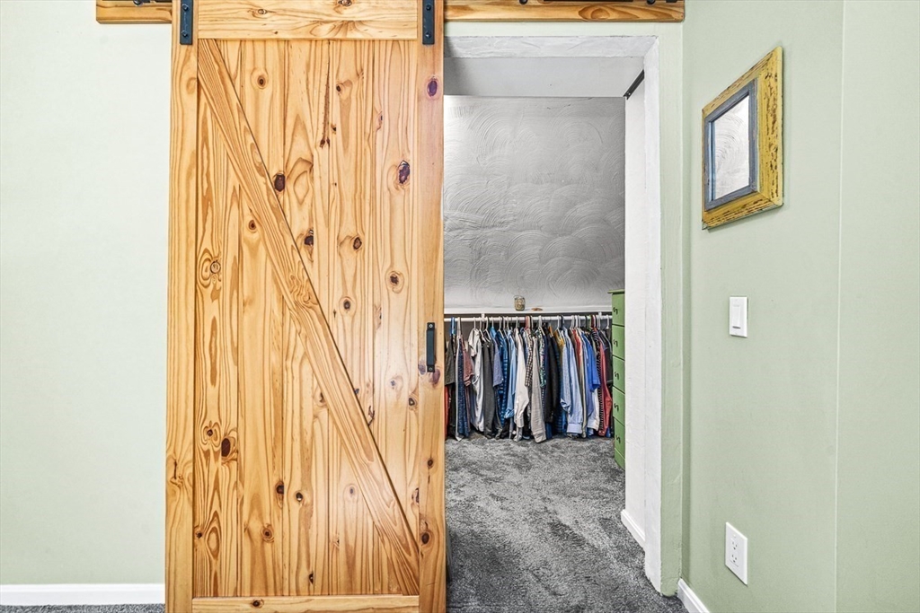 27 A Andrews Farm Road Boxford, MA 01921 - Photo 21 of 37 a view of a door with wooden floor