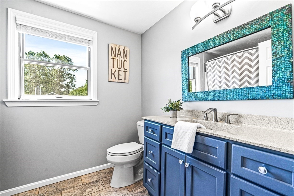 27 A Andrews Farm Road Boxford, MA 01921 - Photo 22 of 37 a bathroom with a toilet a sink and a window