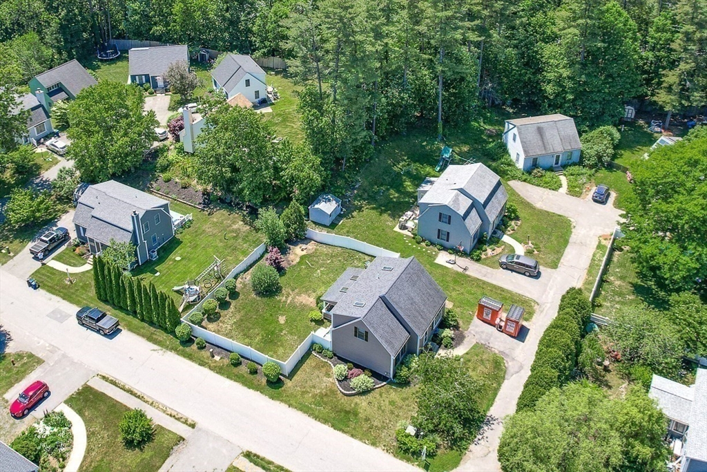 27 A Andrews Farm Road Boxford, MA 01921 - Photo 31 of 37 an aerial view of a house with a garden and trees