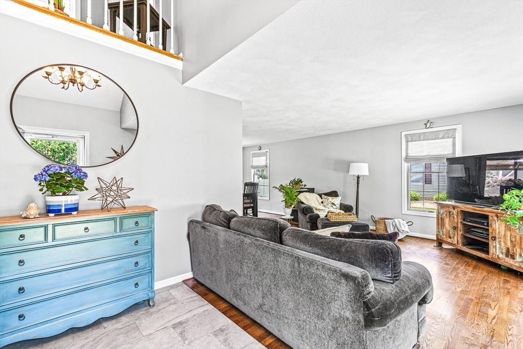 27 A Andrews Farm Road Boxford, MA 01921 - Photo 5 of 37 a living room with furniture and a mirror