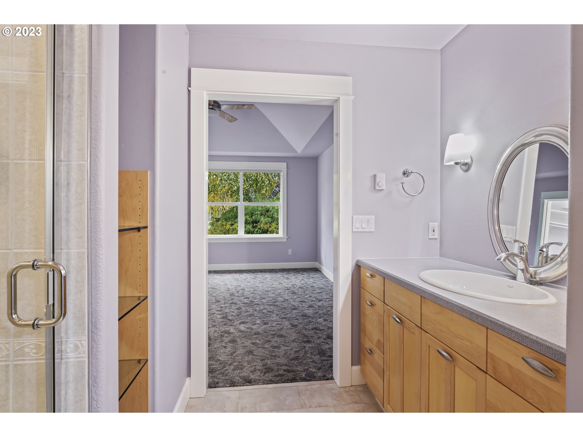 4 Waterford Downs Florence, OR 97439 - Photo 24 of 41 a bathroom with a granite countertop sink a mirror and a shower
