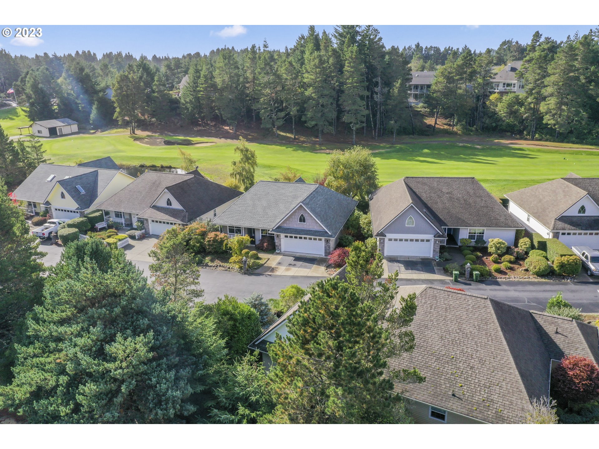 4 Waterford Downs Florence, OR 97439 - Photo 3 of 41 a view of a house with swimming pool and a yard