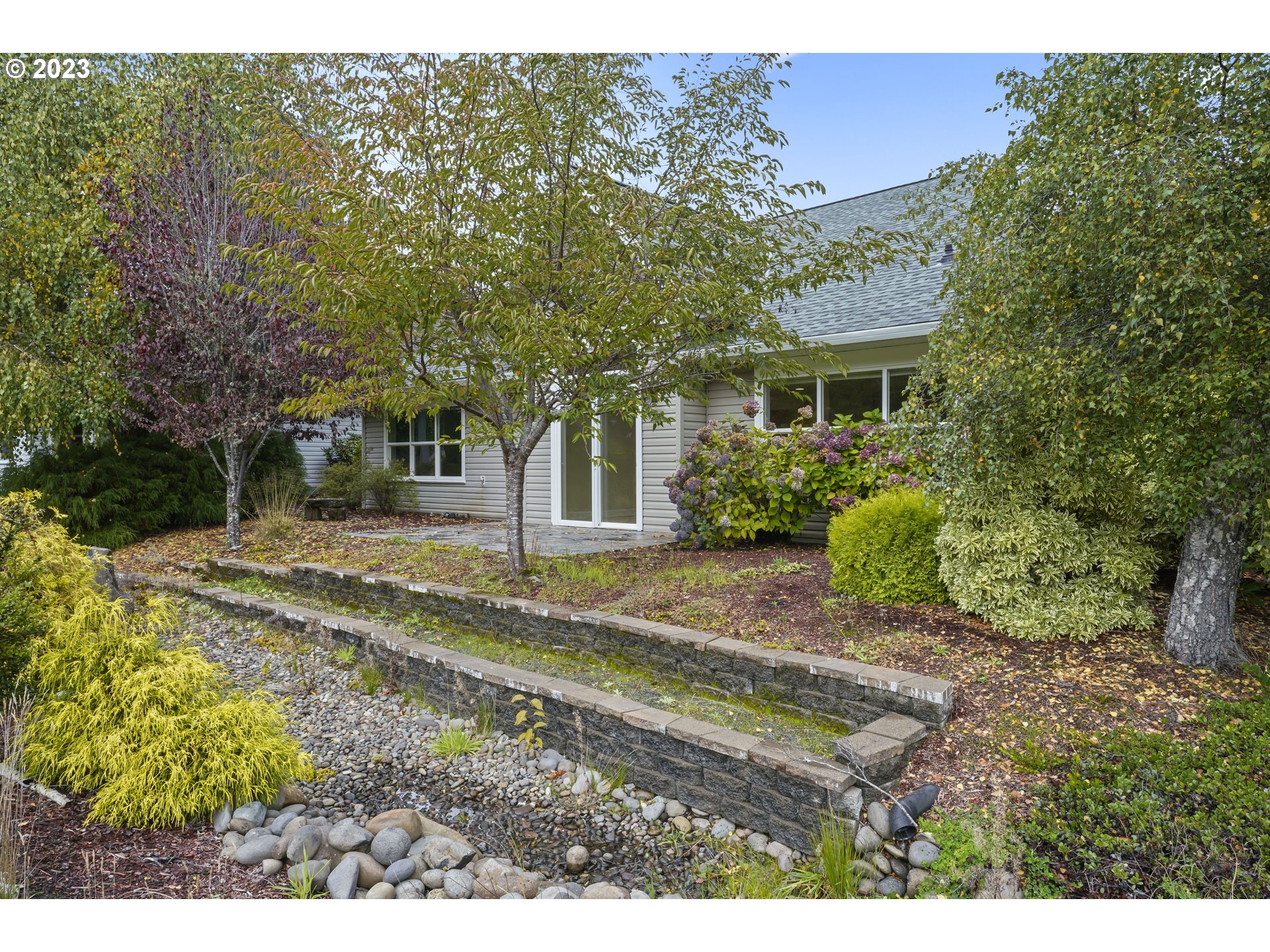 4 Waterford Downs Florence, OR 97439 - Photo 37 of 41 a view of a house with a yard