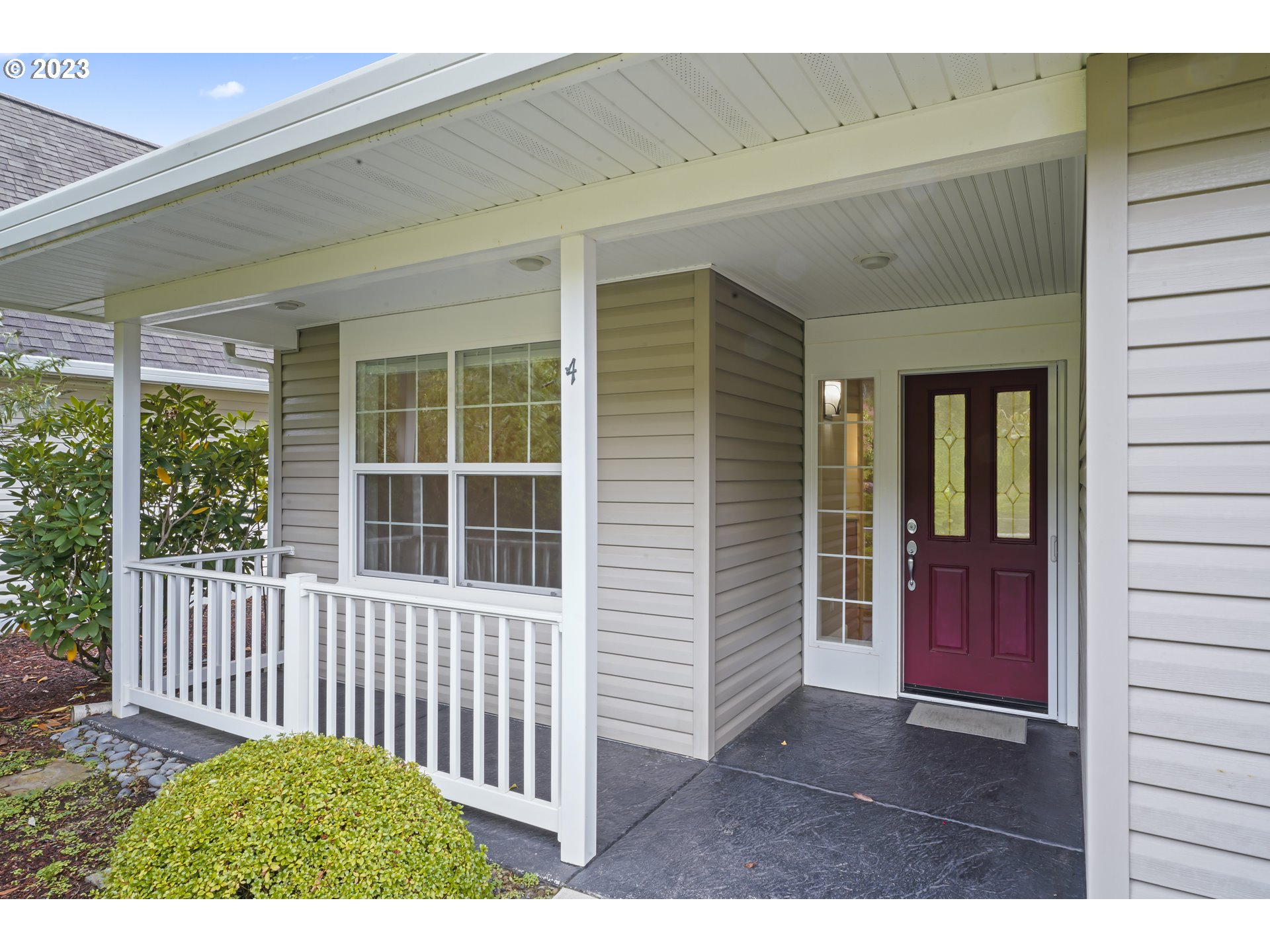 4 Waterford Downs Florence, OR 97439 - Photo 5 of 41 a view of a porch with a table and chair