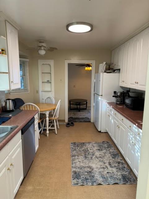 740 Locust Street Santa Clara, CA 95050 - Photo 12 of 15 a kitchen with stainless steel appliances granite countertop a stove top oven a sink a dining table and chairs with wooden floor