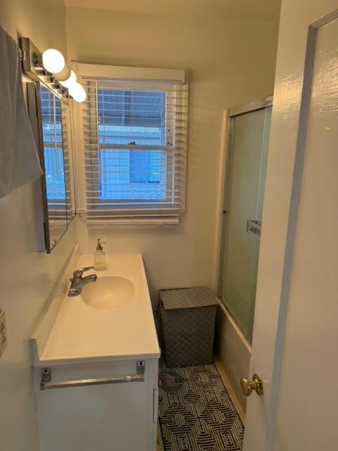 740 Locust Street Santa Clara, CA 95050 - Photo 7 of 15 a bathroom with a sink and shower