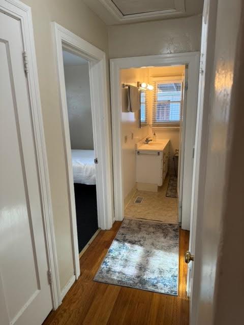 740 Locust Street Santa Clara, CA 95050 - Photo 10 of 15 a bathroom with a sink and a mirror