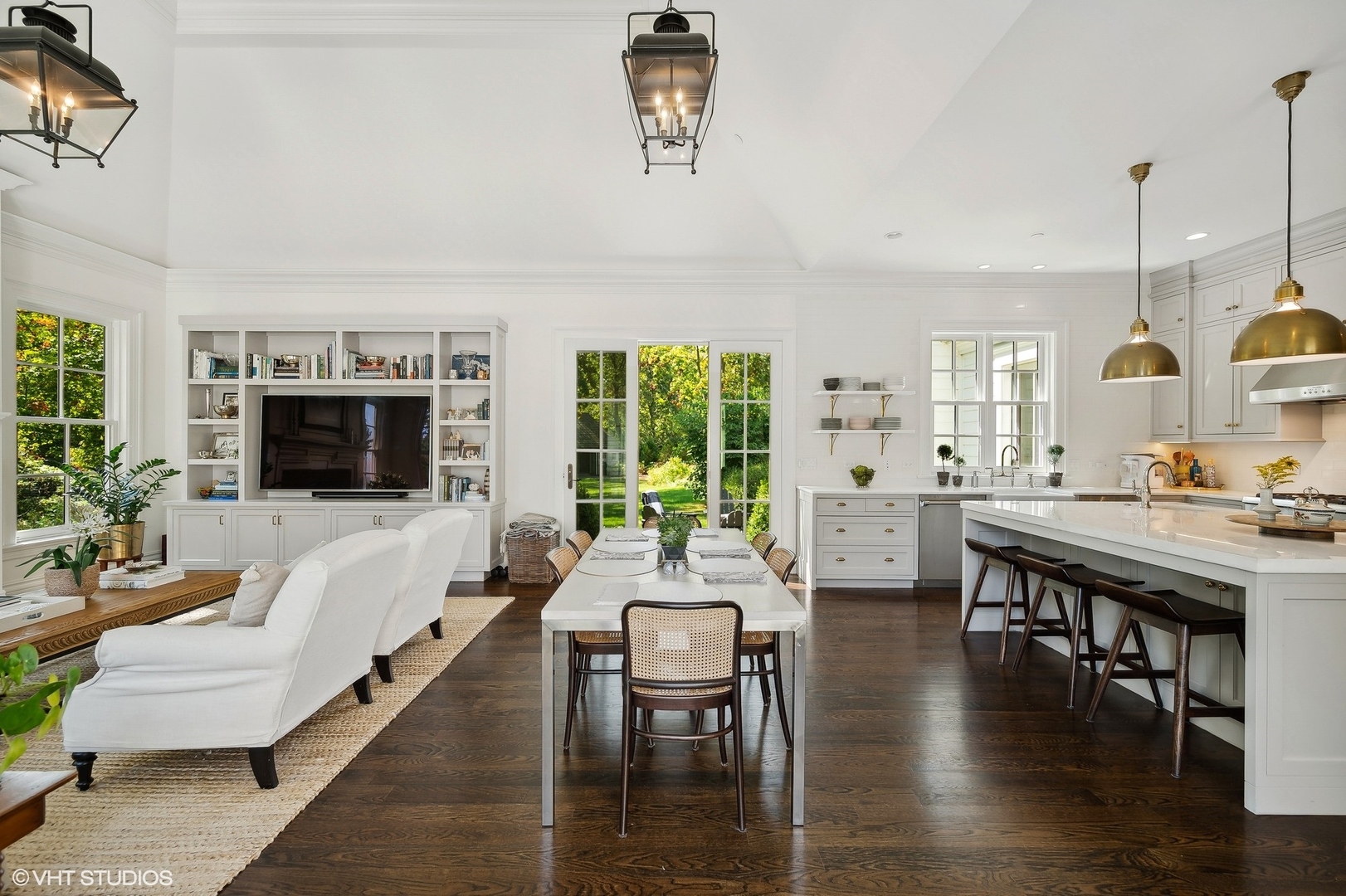 Undisclosed Address Lake Bluff, IL 60044 - Photo 12 of 51 a living room with furniture a flat screen tv and a large window