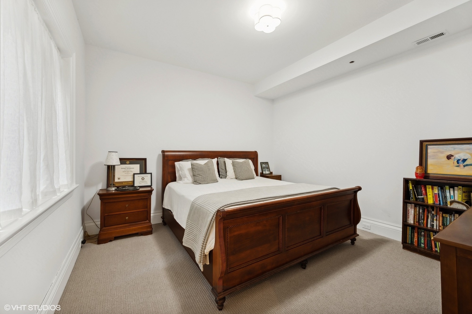 Undisclosed Address Lake Bluff, IL 60044 - Photo 30 of 51 a bedroom with a bed and book shelf