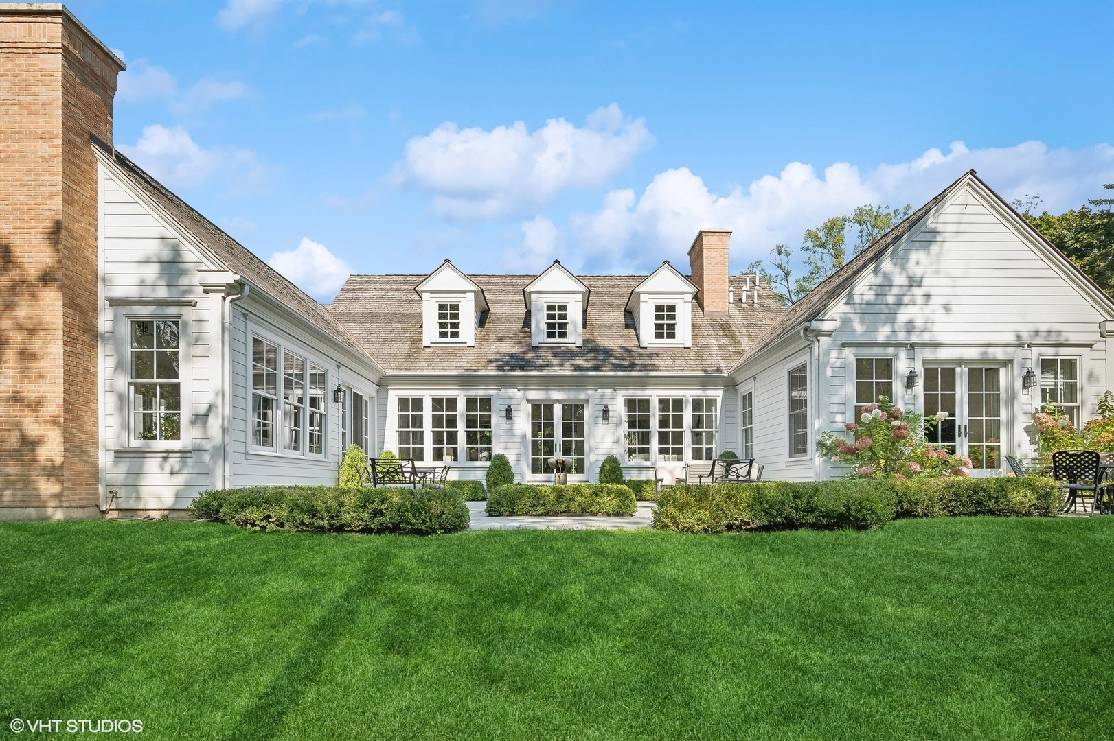 Undisclosed Address Lake Bluff, IL 60044 - Photo 32 of 51 front view of a house with a yard