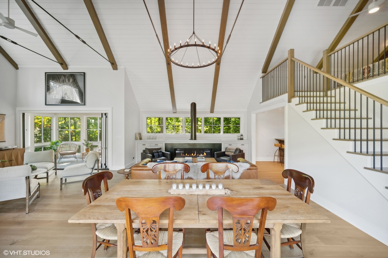 Undisclosed Address Lake Bluff, IL 60044 - Photo 43 of 51 a view of a dining room with furniture a chandelier and wooden floor