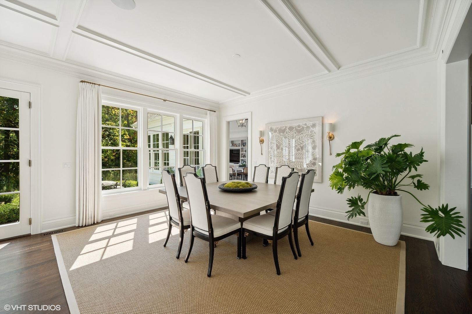 Undisclosed Address Lake Bluff, IL 60044 - Photo 9 of 51 a dining room with furniture potted plants and wooden floor