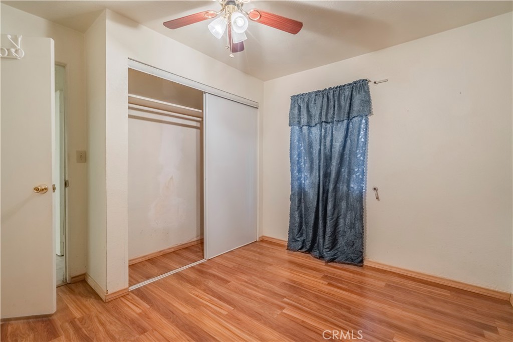 10180 Eddystone Street Riverside, CA 92503 - Photo 18 of 34 a view of a livingroom with wooden floor