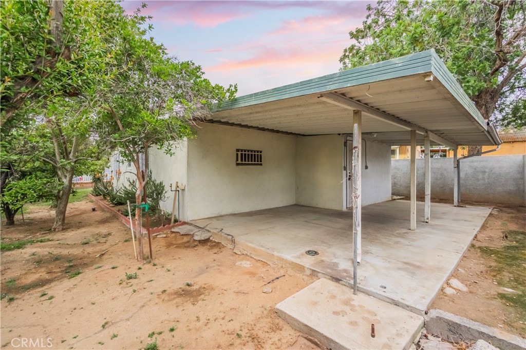 10180 Eddystone Street Riverside, CA 92503 - Photo 31 of 34 a backyard of a house with shaded area