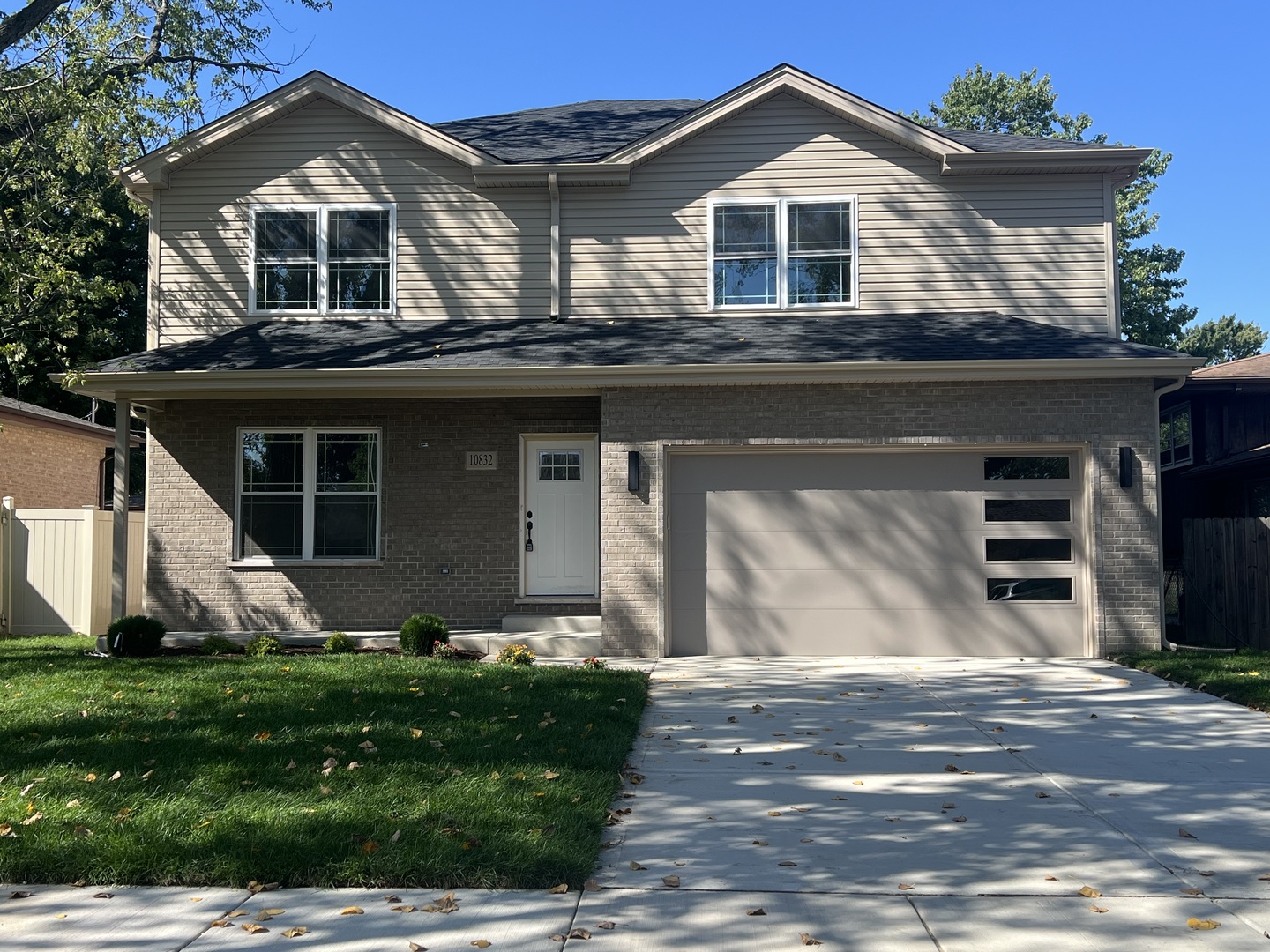 10832 Massasoit Avenue Chicago Ridge, IL 60415 - Photo 1 of 14 a front view of a house with garden