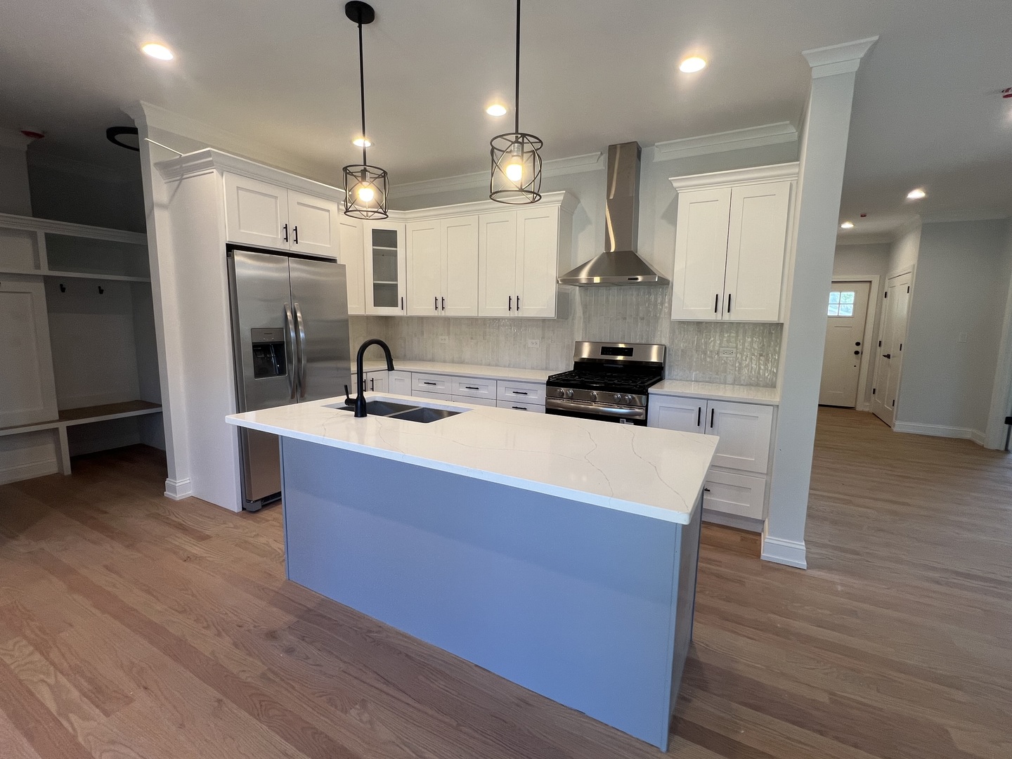 10832 Massasoit Avenue Chicago Ridge, IL 60415 - Photo 3 of 14 a kitchen with stainless steel appliances granite countertop a sink a stove a refrigerator and a oven with wooden floor