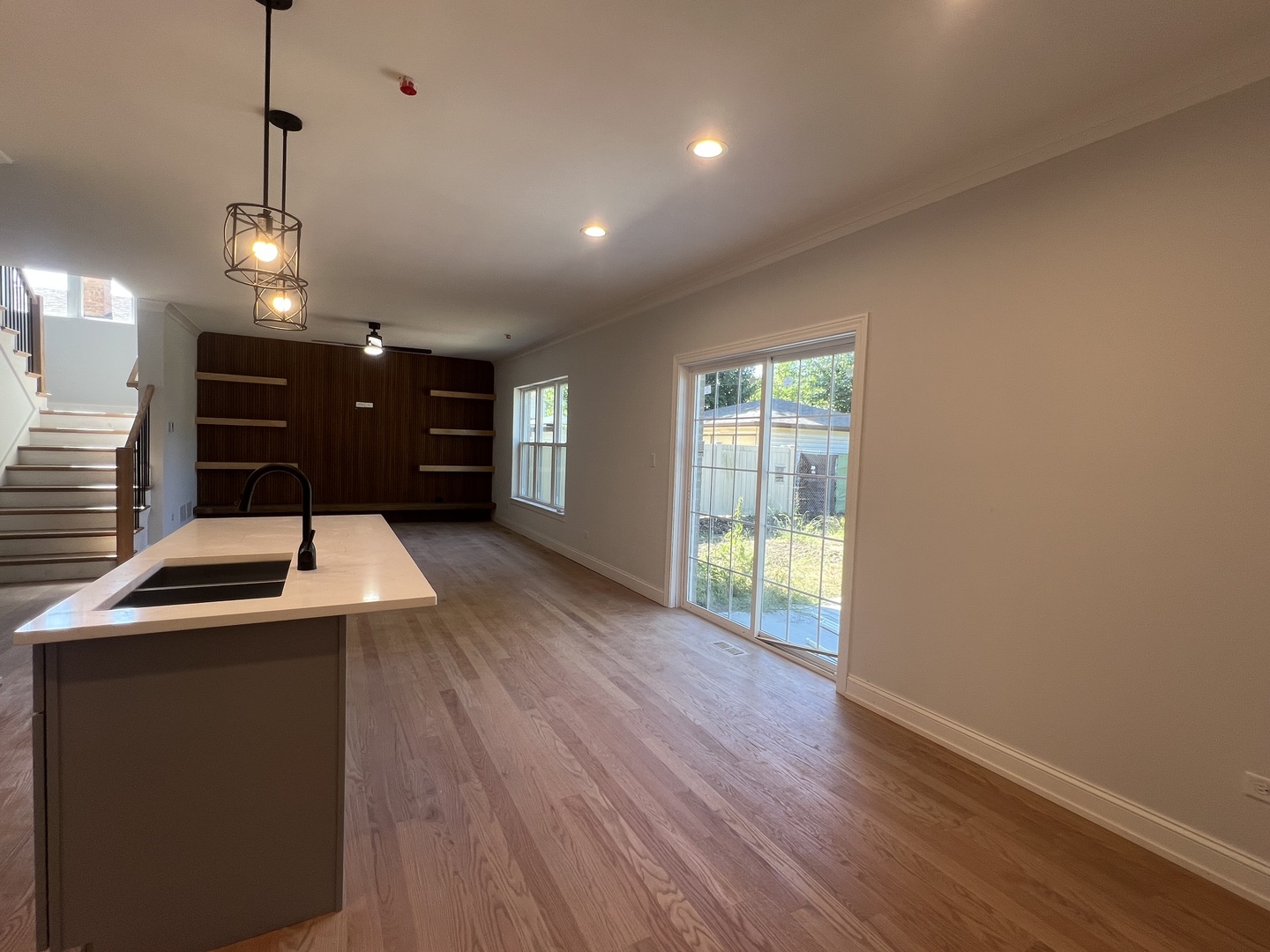 10832 Massasoit Avenue Chicago Ridge, IL 60415 - Photo 6 of 14 a kitchen that has a sink a window and wooden floor
