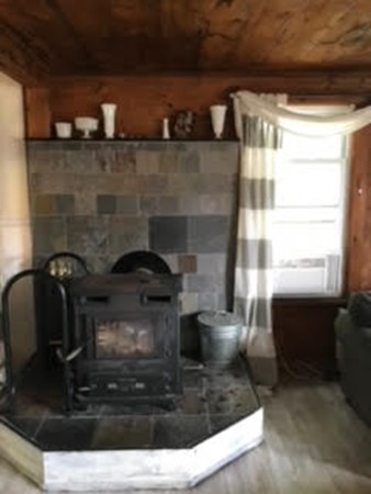 139 Fairview Park Road Sturbridge, MA 01566 - Photo 4 of 15 a close view of a fireplace