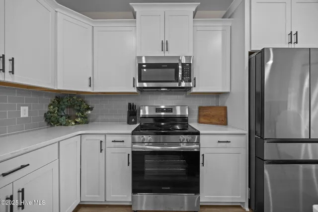 $435,000 | 1029 Setting Sun Boulevard Northeast, Winnabow, NC 28479