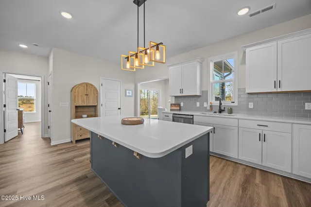 $435,000 | 1029 Setting Sun Boulevard Northeast, Winnabow, NC 28479