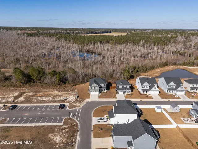 $435,000 | 1029 Setting Sun Boulevard Northeast, Winnabow, NC 28479