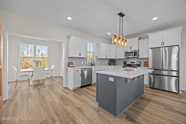 $435,000 | 1029 Setting Sun Boulevard Northeast, Winnabow, NC 28479