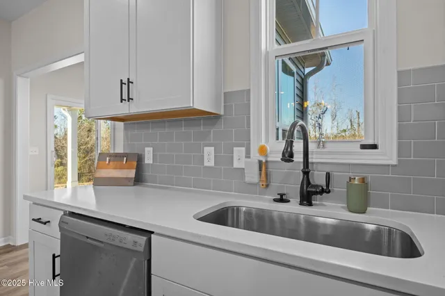 $435,000 | 1029 Setting Sun Boulevard Northeast, Winnabow, NC 28479