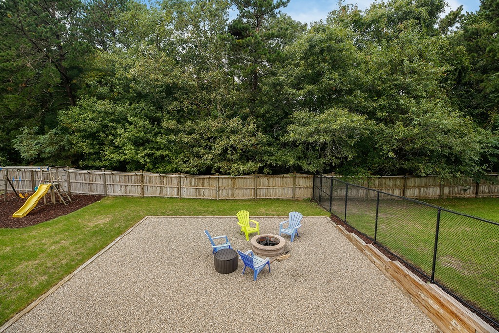 20 Chamber Rock Road Bourne, MA 02532 - Photo 26 of 30 a view of a garden with swimming pool