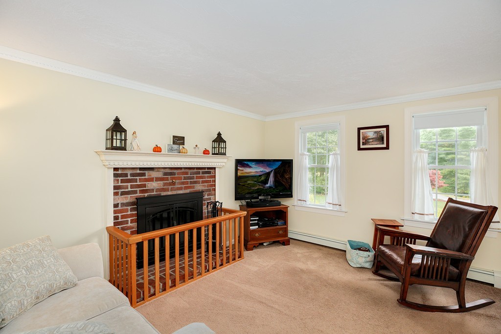 20 Chamber Rock Road Bourne, MA 02532 - Photo 3 of 30 a living room with furniture and a flat screen tv