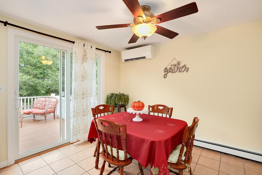 20 Chamber Rock Road Bourne, MA 02532 - Photo 10 of 30 a view of a dining room with furniture window and outside view
