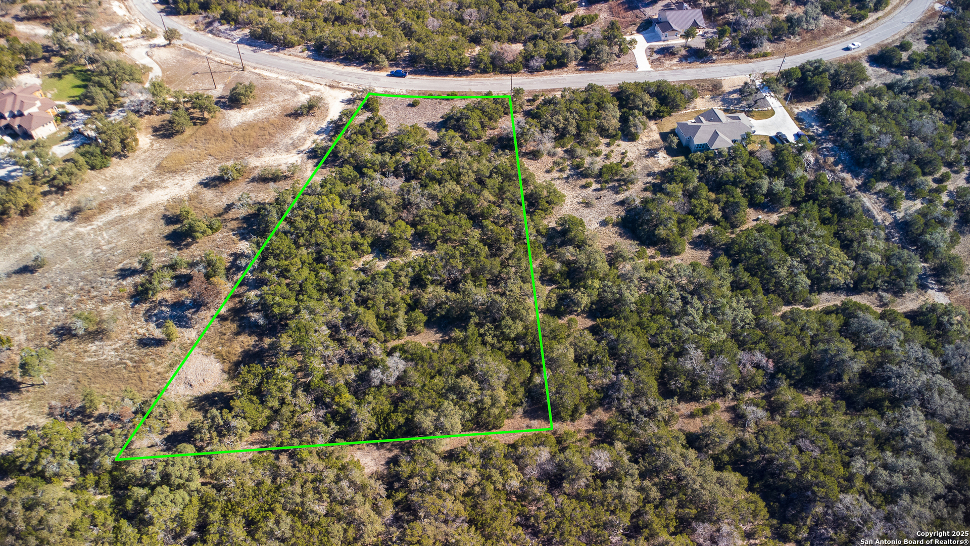 1250 Primrose Path Spring Branch, TX 78070 - Photo 8 of 14 a view of a forest with a building