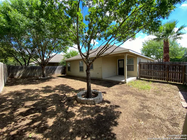 a house with trees in front of it