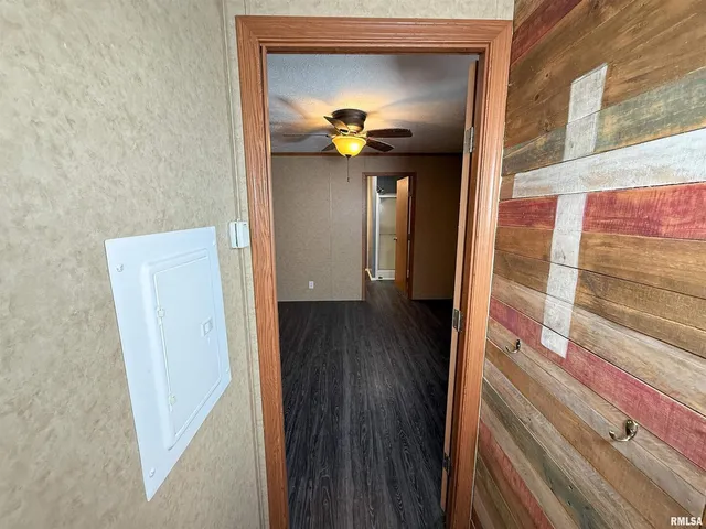 a bathroom with a glass door shower and toilet
