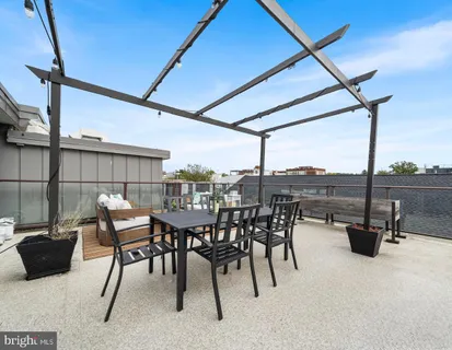 a view of an outdoor space with furniture