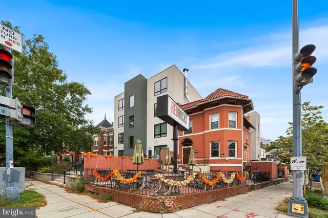 a view of street with shops
