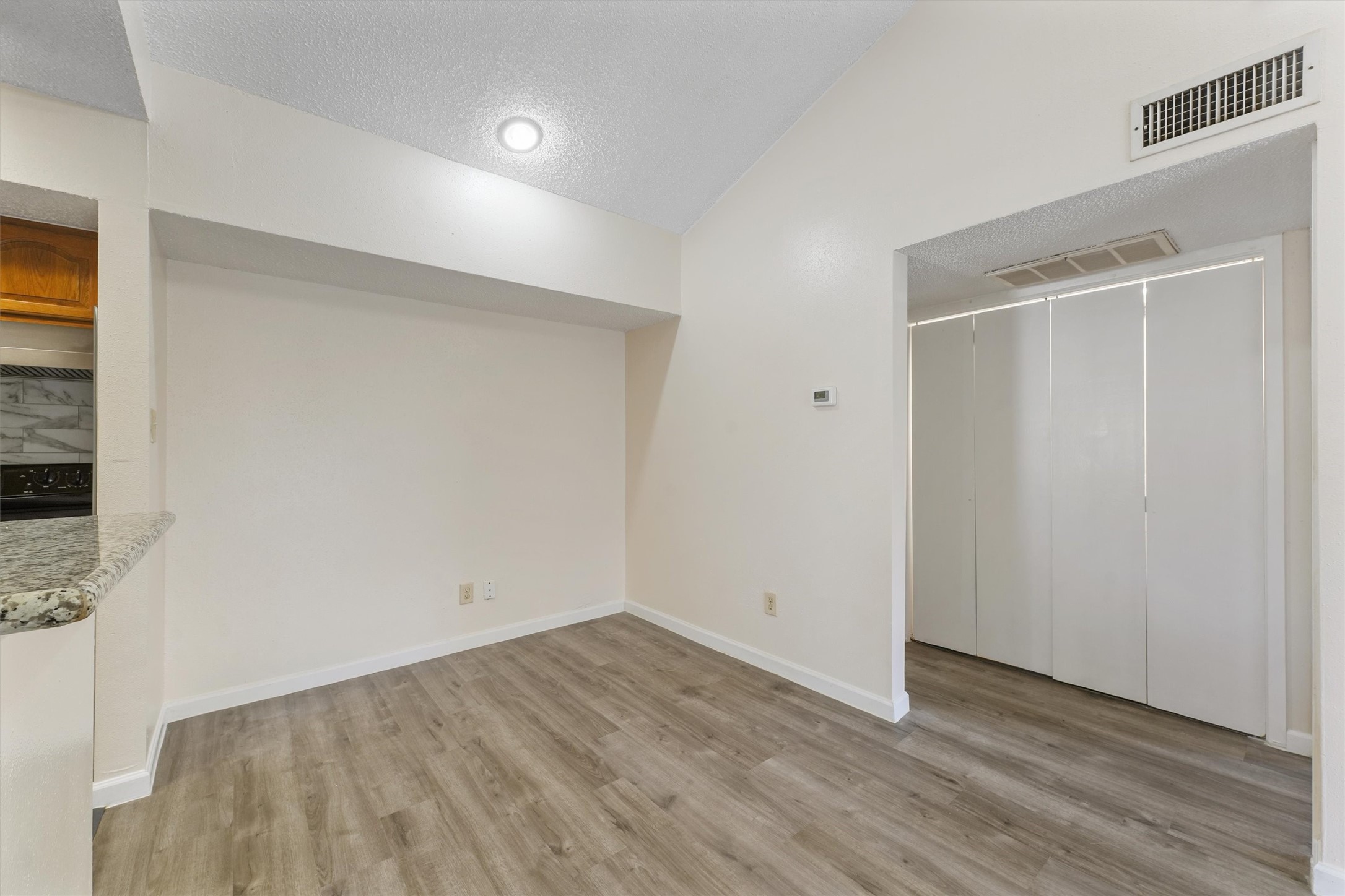9221 Imogene Street, Unit 9221 Houston, TX 77036 - Photo 12 of 19 a view of an empty room
