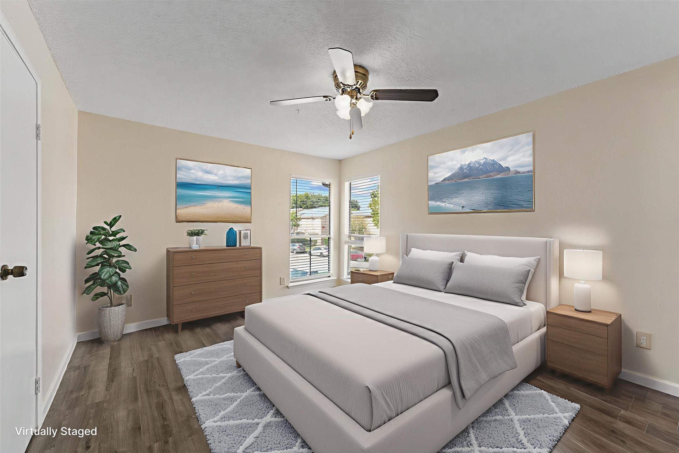 9221 Imogene Street, Unit 9221 Houston, TX 77036 - Photo 5 of 19 a bedroom with a large bed and a chandelier