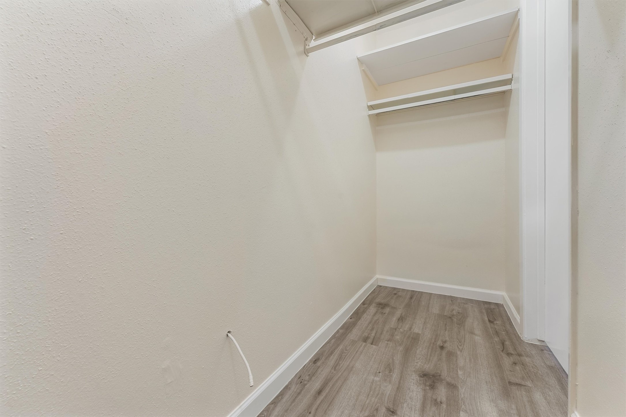 9221 Imogene Street, Unit 9221 Houston, TX 77036 - Photo 7 of 19 a view of a room with wooden floor